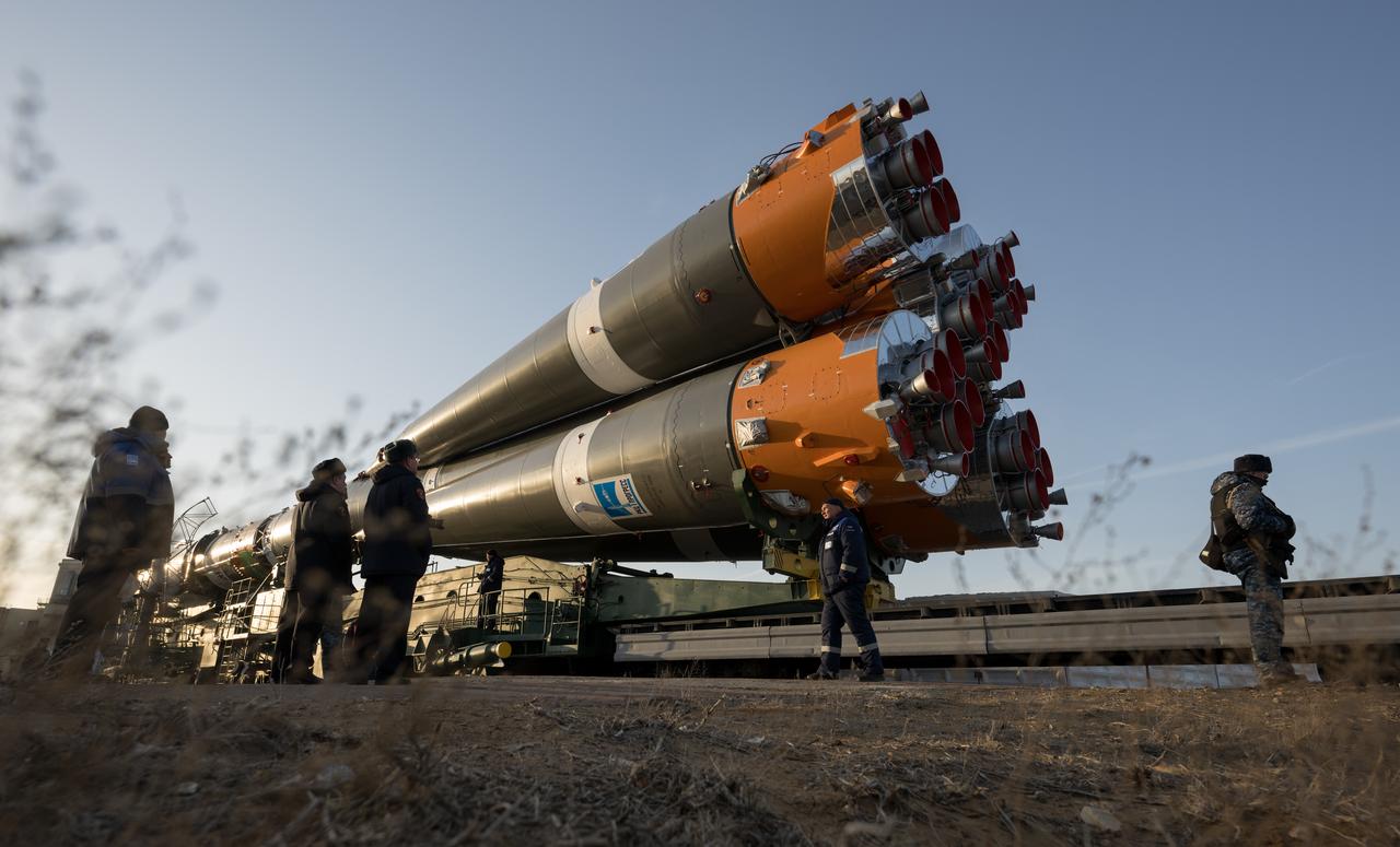 The Soyuz rocket is rolled out by train to the launch pad at Site 31, Monday, March 18, 2024, at the Baikonur Cosmodrome in Kazakhstan. Expedition 71 NASA astronaut Tracy Dyson, Roscosmos cosmonaut Oleg Novitskiy, and Belarus spaceflight participant Marina Vasilevskaya are scheduled to launch aboard their Soyuz MS-25 spacecraft on March 21. Photo Credit: (NASA/Bill Ingalls)