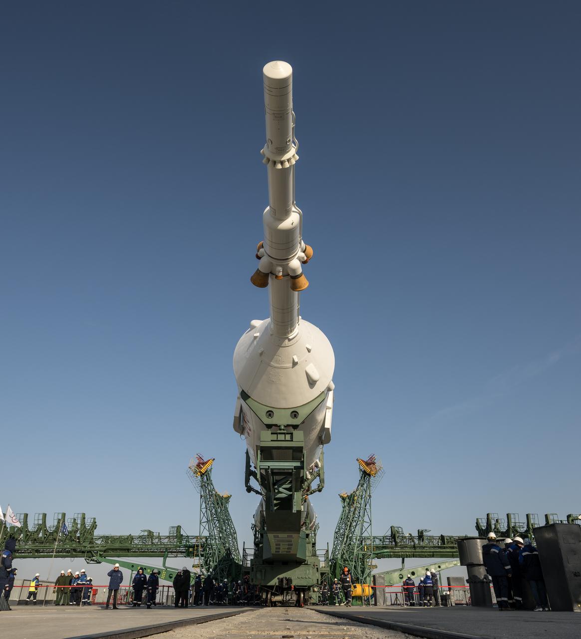 The Soyuz rocket is rolled out by train to the launch pad at Site 31, Monday, March 18, 2024, at the Baikonur Cosmodrome in Kazakhstan. Expedition 71 NASA astronaut Tracy Dyson, Roscosmos cosmonaut Oleg Novitskiy, and Belarus spaceflight participant Marina Vasilevskaya are scheduled to launch aboard their Soyuz MS-25 spacecraft on March 21. Photo Credit: (NASA/Bill Ingalls)