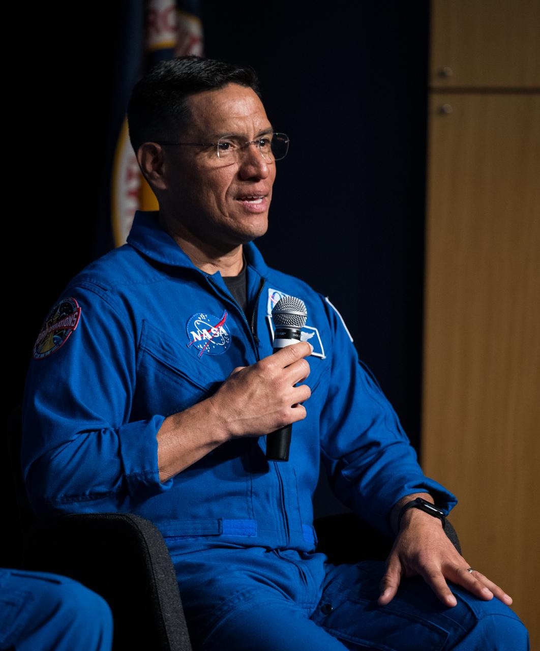 Expedition 69 NASA astronaut Frank Rubio is seen as he and fellow crewmates NASA astronauts Stephen Bowen and Warren Hoburg, and  UAE (United Arab Emirates) astronaut Sultan Alneyadi speak about their time onboard the International Space Station as part of Expedition 69 during an employee engagement event Tuesday, March 19, 2024, at the Mary W. Jackson NASA Headquarters building in Washington.  Bowen, Hoburg, and Alneyadi spent 186 days aboard the International Space Station as part of Expedition 69; while Rubio set a new record for the longest single spaceflight by a U.S. astronaut, spending 371 days in orbit on an extended mission spanning Expeditions 68 and 69. Photo Credit: (NASA/Aubrey Gemignani)
