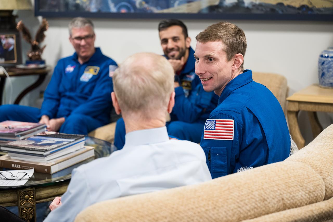 Expedition 69 NASA astronaut Warren Hoburg is seen as he and fellow crewmates NASA astronauts Stephen Bowen and Frank Rubio, and  UAE (United Arab Emirates) astronaut Sultan Alneyadi meet with NASA Administrator Bill Nelson and Deputy Administrator Pam Melroy, Tuesday, March 19, 2024 at the Mary W. Jackson NASA Headquarters building in Washington. Bowen, Hoburg, and Alneyadi spent 186 days aboard the International Space Station as part of Expedition 69; while Rubio set a new record for the longest single spaceflight by a U.S. astronaut, spending 371 days in orbit on an extended mission spanning Expeditions 68 and 69. Photo Credit: (NASA/Aubrey Gemignani)