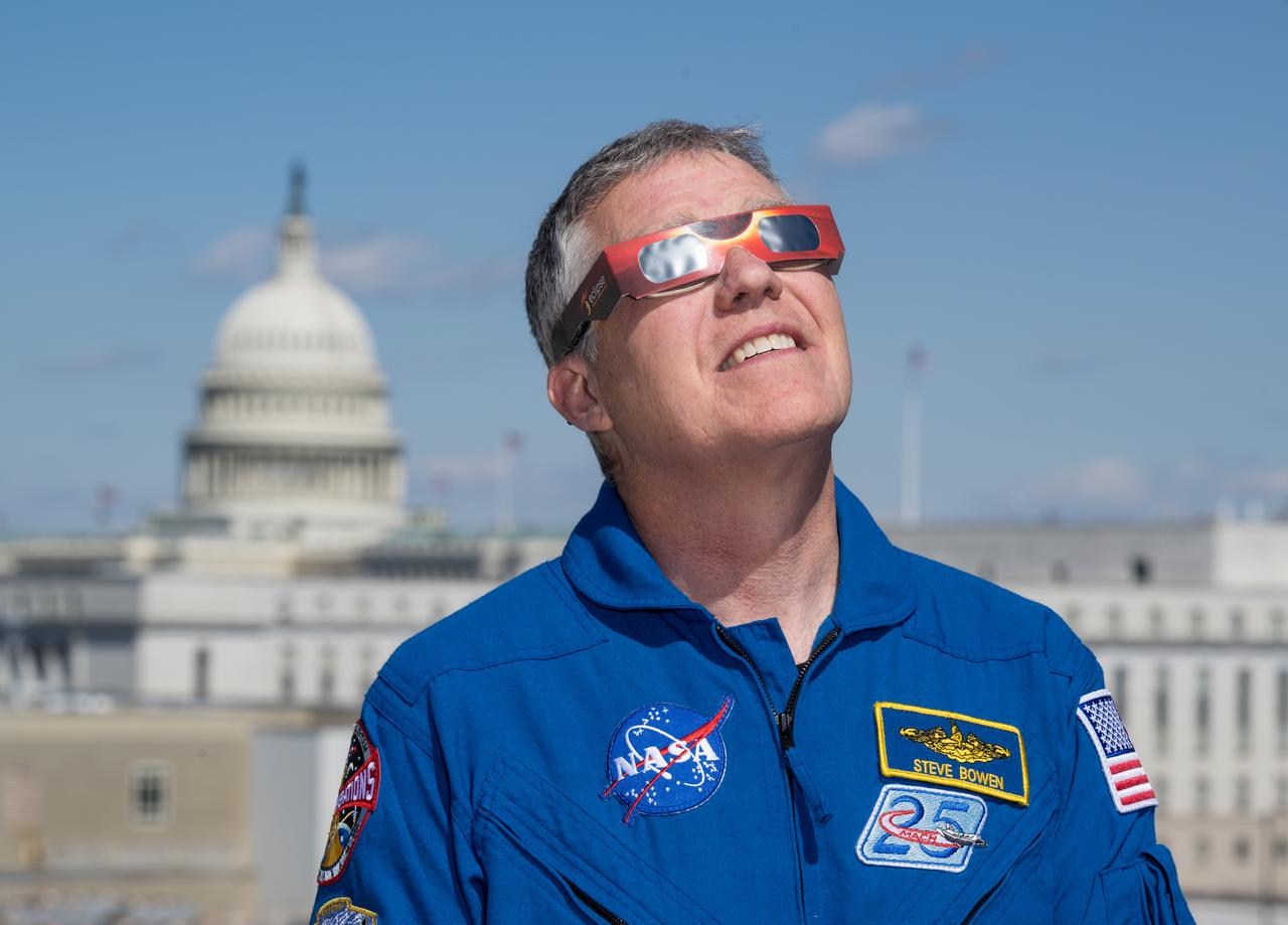 NASA astronaut Stephen Bowen poses for a photo wearing solar glasses, Tuesday, March 19, 2024, at the Mary W. Jackson NASA Headquarters building in Washington. Bowen and Expedition 69 crewmates NASA astronaut Warren Hoburg, and UAE (United Arab Emirates) astronaut Sultan Alneyadi spent 186 days aboard the International Space Station as part of Expedition 69; while NASA astronaut Frank Rubio set a new record for the longest single spaceflight by a U.S. astronaut, spending 371 days in orbit on an extended mission spanning Expeditions 68 and 69. Photo Credit: (NASA/Aubrey Gemignani)