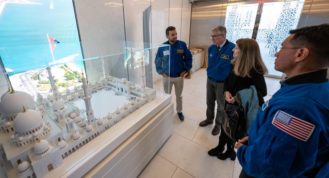 From left to right, UAE (United Arab Emirates) astronaut Sultan Alneyadi, NASA astronaut Stephen Bowen, NASA Associate Administrator for International and Interagency Relations Karen Feldstein, and NASA astronaut Frank Rubio view a scale model of the Sheikh Zayed Grand Mosque prior to an Iftar dinner, Thursday, March 21, 2024, at the UAE Embassy in Washington. Bowen and Alneyadi spent 186 days aboard the International Space Station as part of Expedition 69; while Rubio set a new record for the longest single spaceflight by a U.S. astronaut, spending 371 days in orbit on an extended mission spanning Expeditions 68 and 69. Photo Credit: (NASA/Keegan Barber)