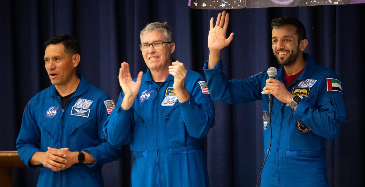 UAE (United Arab Emirates) astronaut Sultan Alneyadi, right, is seen with NASA astronauts Frank Rubio and Stephen Bowen as they speak to students, Friday, March 22, 2024, during a visit to Rolling Terrance Elementary School in Takoma Park, Maryland. Bowen and Alneyadi spent 186 days aboard the International Space Station as part of Expedition 69; while Rubio set a new record for the longest single spaceflight by a U.S. astronaut, spending 371 days in orbit on an extended mission spanning Expeditions 68 and 69..  Photo Credit: (NASA/Joel Kowsky)