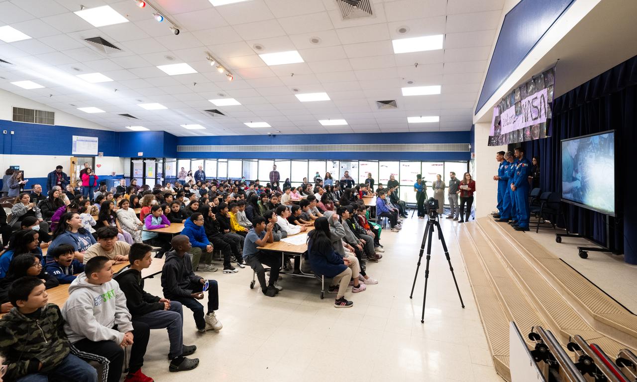 NASA astronauts Frank Rubio and Stephen Bowen and UAE (United Arab Emirates) astronaut Sultan Alneyadi are seen during a visit to Rolling Terrace Elementary School, Friday, March 22, 2024, in Takoma Park, Maryland. Bowen and Alneyadi spent 186 days aboard the International Space Station as part of Expedition 69; while Rubio set a new record for the longest single spaceflight by a U.S. astronaut, spending 371 days in orbit on an extended mission spanning Expeditions 68 and 69. Photo Credit: (NASA/Joel Kowsky)