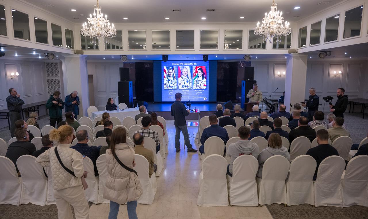 NASA, Roscosmos, and Russian Search and Recovery Forces meet at the Cosmonaut Hotel in Karaganda, Kazakhstan, Thursday, April 4, 2024, to discuss the readiness for the landing of Expedition 70 NASA astronaut Loral O'Hara, Roscosmos cosmonaut Oleg Novitskiy, and Belarus spaceflight participant Marina Vasilevskaya. Photo Credit: (NASA/Bill Ingalls)