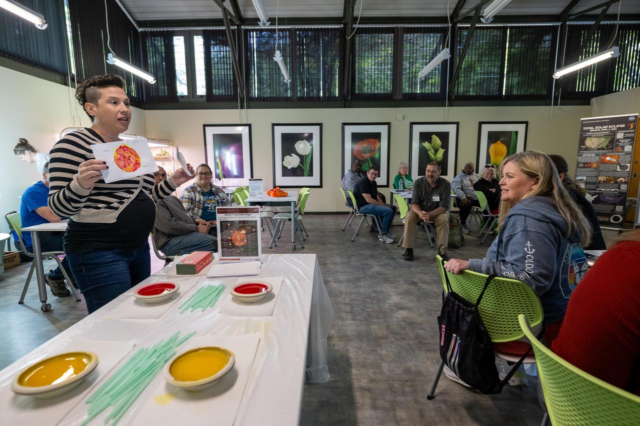 NASA Education Specialist Christine Milotte demonstrates heliophysics activities during a teacher professional development event hosted by the NASA Heliophysics Education Activation Team (HEAT) at the Dallas Arboretum, Saturday, April 6, 2024, in Dallas, Texas. Photo Credit: (NASA/Keegan Barber)