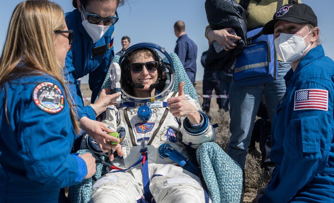 Expedition 70 NASA astronaut Loral O'Hara is seen outside the Soyuz MS-24 spacecraft after she, Roscosmos cosmonaut Oleg Novitskiy, and Belarus spaceflight participant Marina Vasilevskaya landed in a remote area near the town of Zhezkazgan, Kazakhstan on Saturday, April 6, 2024. O’Hara is returning to Earth after logging 204 days in space as a member of Expeditions 69-70 aboard the International Space Station and Novitskiy and Vasilevskaya return after having spent the last 14 days in space. Photo Credit (NASA/Bill Ingalls)