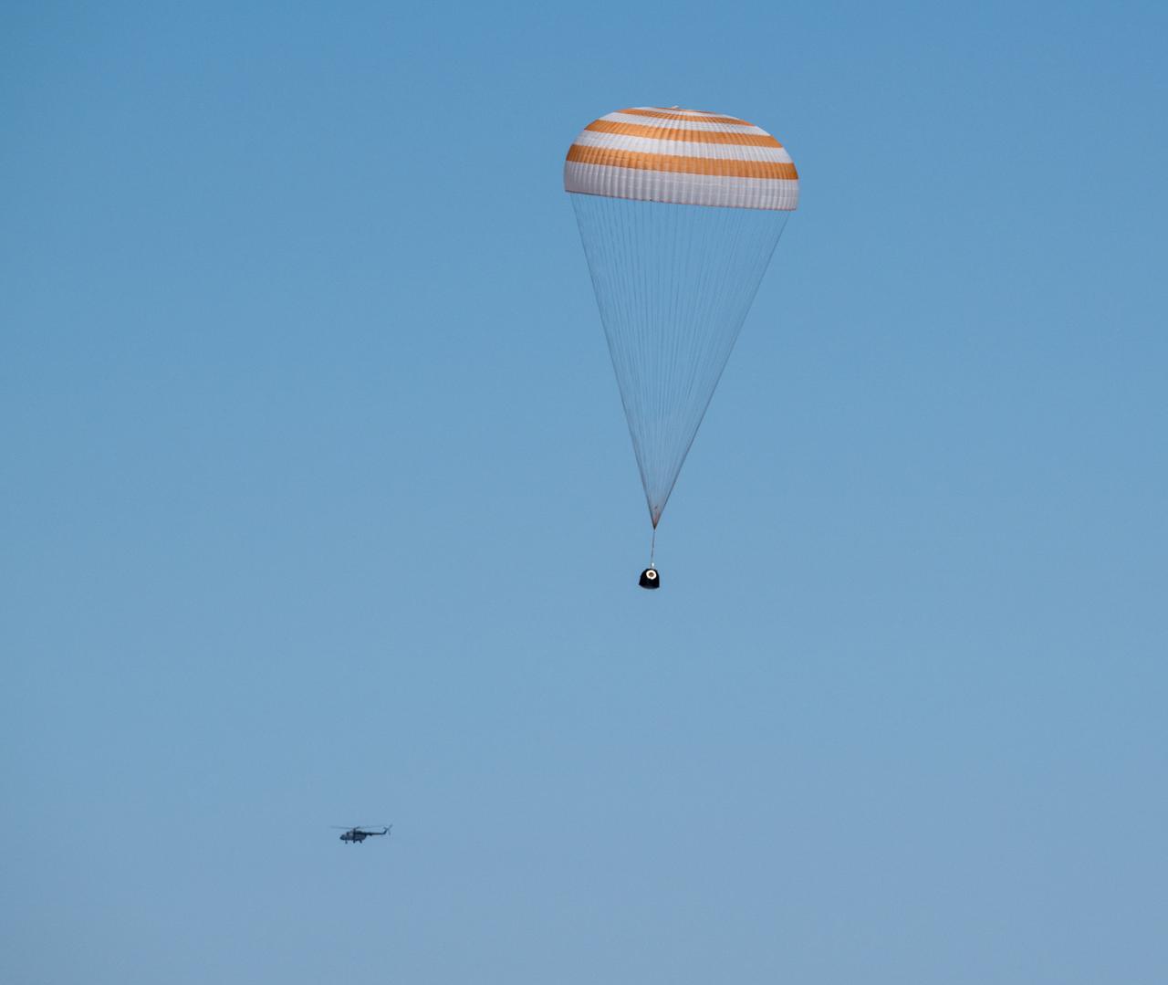 The Soyuz MS-24 spacecraft is seen as it lands in a remote area near the town of Zhezkazgan, Kazakhstan with Expedition 70 NASA astronaut Loral O'Hara, Roscosmos cosmonaut Oleg Novitskiy, and Belarus spaceflight participant Marina Vasilevskaya, Saturday, April 6, 2024. O’Hara is returning to Earth after logging 204 days in space as a member of Expeditions 69-70 aboard the International Space Station and Novitskiy and Vasilevskaya return after having spent the last 14 days in space. Photo Credit (NASA/Bill Ingalls)