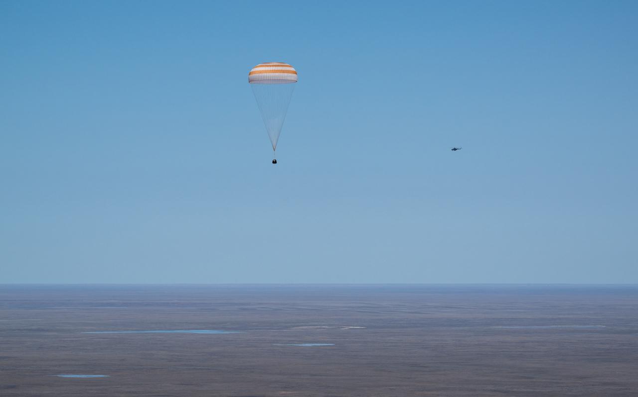 The Soyuz MS-24 spacecraft is seen as it lands in a remote area near the town of Zhezkazgan, Kazakhstan with Expedition 70 NASA astronaut Loral O'Hara, Roscosmos cosmonaut Oleg Novitskiy, and Belarus spaceflight participant Marina Vasilevskaya, Saturday, April 6, 2024. O’Hara is returning to Earth after logging 204 days in space as a member of Expeditions 69-70 aboard the International Space Station and Novitskiy and Vasilevskaya return after having spent the last 14 days in space. Photo Credit (NASA/Bill Ingalls)
