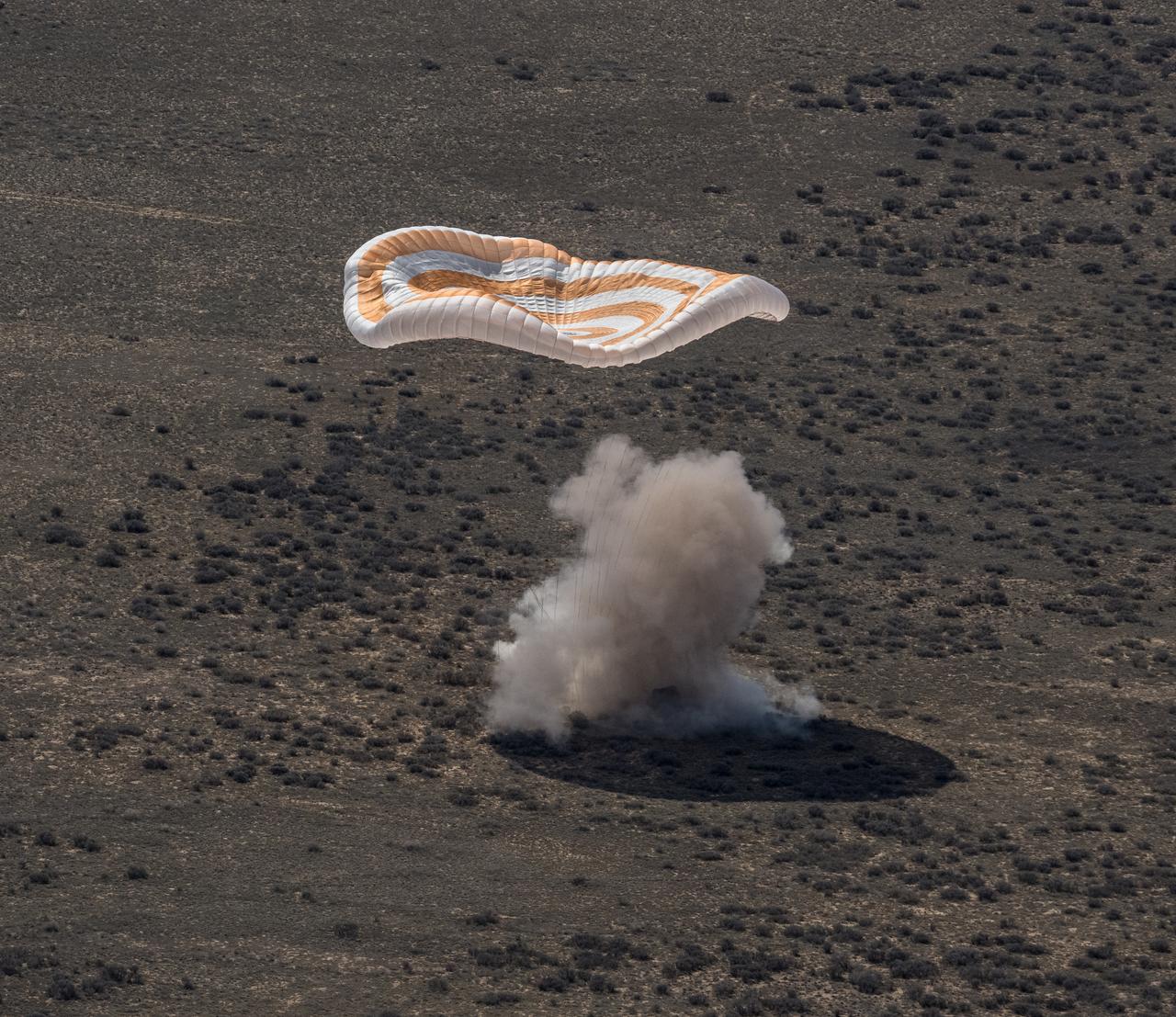 The Soyuz MS-24 spacecraft is seen as it lands in a remote area near the town of Zhezkazgan, Kazakhstan with Expedition 70 NASA astronaut Loral O'Hara, Roscosmos cosmonaut Oleg Novitskiy, and Belarus spaceflight participant Marina Vasilevskaya, Saturday, April 6, 2024. O’Hara is returning to Earth after logging 204 days in space as a member of Expeditions 69-70 aboard the International Space Station and Novitskiy and Vasilevskaya return after having spent the last 14 days in space. Photo Credit (NASA/Bill Ingalls)