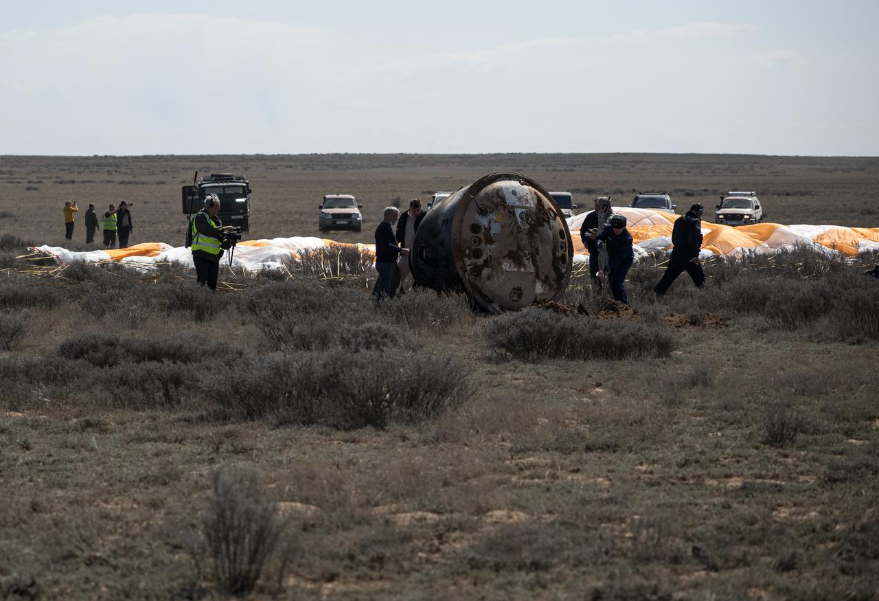 Russian Search and Rescue teams arrive at the Soyuz MS-24 spacecraft shortly after it landed in a remote area near the town of Zhezkazgan, Kazakhstan with Expedition 70 NASA astronaut Loral O'Hara, Roscosmos cosmonaut Oleg Novitskiy, and Belarus spaceflight participant Marina Vasilevskaya, Saturday, April 6, 2024. O’Hara is returning to Earth after logging 204 days in space as a member of Expeditions 69-70 aboard the International Space Station and Novitskiy and Vasilevskaya return after having spent the last 14 days in space. Photo Credit (NASA/Bill Ingalls)