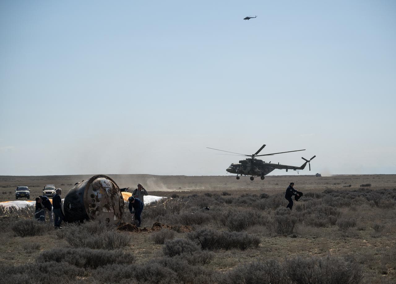 Russian Search and Rescue teams arrive at the Soyuz MS-24 spacecraft shortly after it landed in a remote area near the town of Zhezkazgan, Kazakhstan with Expedition 70 NASA astronaut Loral O'Hara, Roscosmos cosmonaut Oleg Novitskiy, and Belarus spaceflight participant Marina Vasilevskaya, Saturday, April 6, 2024. O’Hara is returning to Earth after logging 204 days in space as a member of Expeditions 69-70 aboard the International Space Station and Novitskiy and Vasilevskaya return after having spent the last 14 days in space. Photo Credit (NASA/Bill Ingalls)
