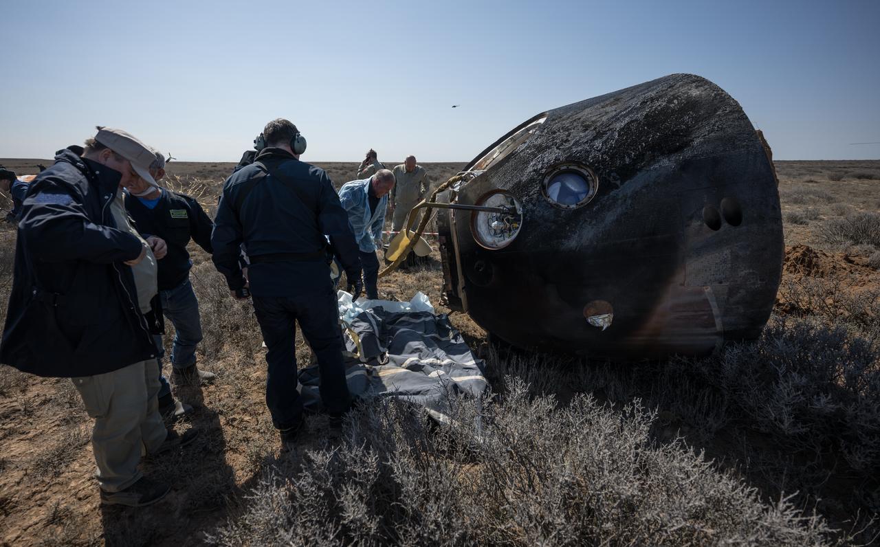 Russian Search and Rescue teams arrive at the Soyuz MS-24 spacecraft shortly after it landed in a remote area near the town of Zhezkazgan, Kazakhstan with Expedition 70 NASA astronaut Loral O'Hara, Roscosmos cosmonaut Oleg Novitskiy, and Belarus spaceflight participant Marina Vasilevskaya, Saturday, April 6, 2024. O’Hara is returning to Earth after logging 204 days in space as a member of Expeditions 69-70 aboard the International Space Station and Novitskiy and Vasilevskaya return after having spent the last 14 days in space. Photo Credit (NASA/Bill Ingalls)