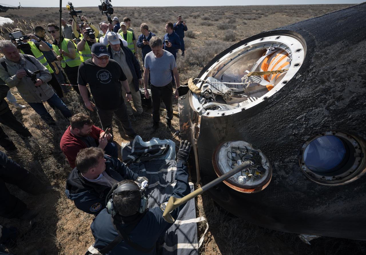 Russian Search and Rescue teams arrive at the Soyuz MS-24 spacecraft shortly after it landed in a remote area near the town of Zhezkazgan, Kazakhstan with Expedition 70 NASA astronaut Loral O'Hara, Roscosmos cosmonaut Oleg Novitskiy, and Belarus spaceflight participant Marina Vasilevskaya, Saturday, April 6, 2024. O’Hara is returning to Earth after logging 204 days in space as a member of Expeditions 69-70 aboard the International Space Station and Novitskiy and Vasilevskaya return after having spent the last 14 days in space. Photo Credit (NASA/Bill Ingalls)