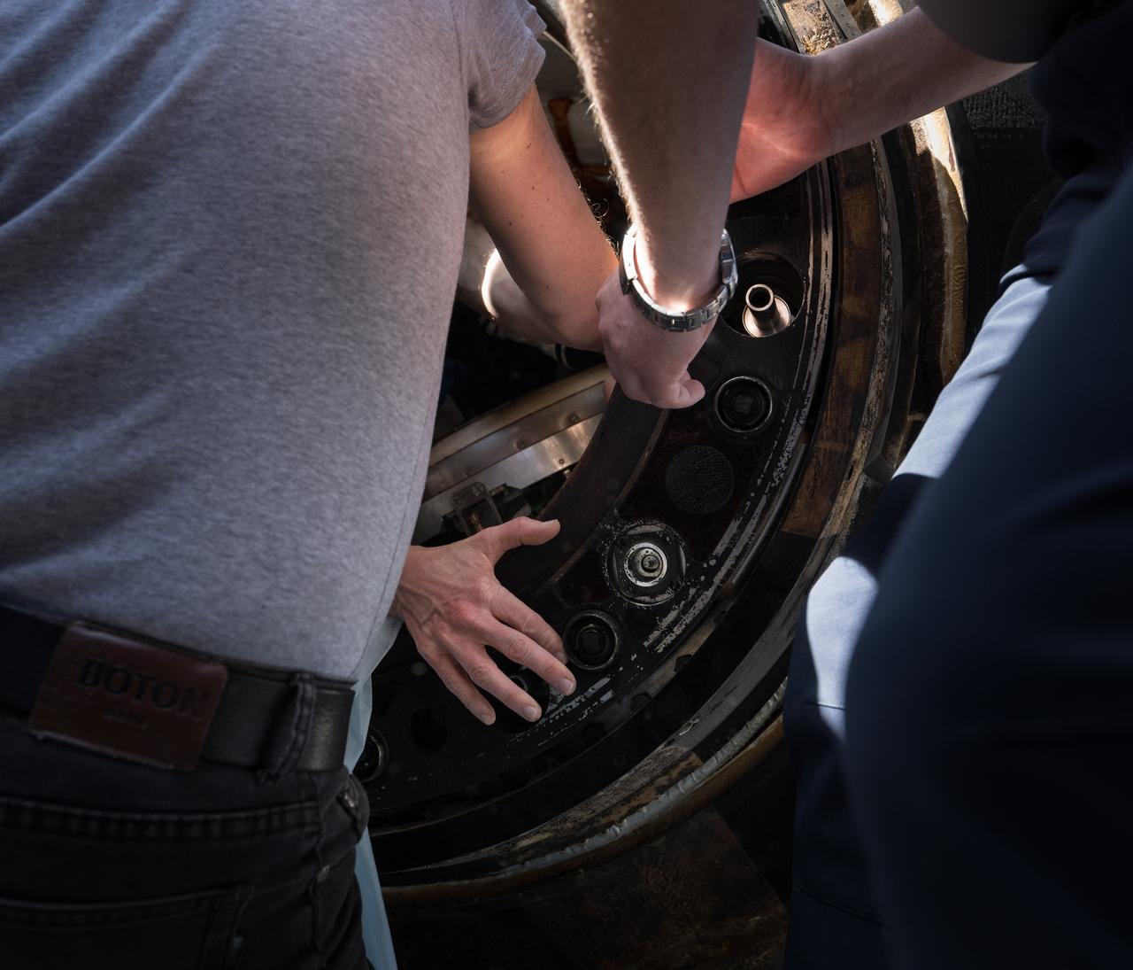 The hand of Expedition 70 NASA astronaut Loral O'Hara is seen as she is helped out of the Soyuz MS-24 spacecraft just minutes after she, Roscosmos cosmonaut Oleg Novitskiy, and Belarus spaceflight participant Marina Vasilevskaya, landed in a remote area near the town of Zhezkazgan, Kazakhstan on Saturday, April 6, 2024. O’Hara is returning to Earth after logging 204 days in space as a member of Expeditions 69-70 aboard the International Space Station and Novitskiy and Vasilevskaya return after having spent the last 14 days in space. Photo Credit (NASA/Bill Ingalls)