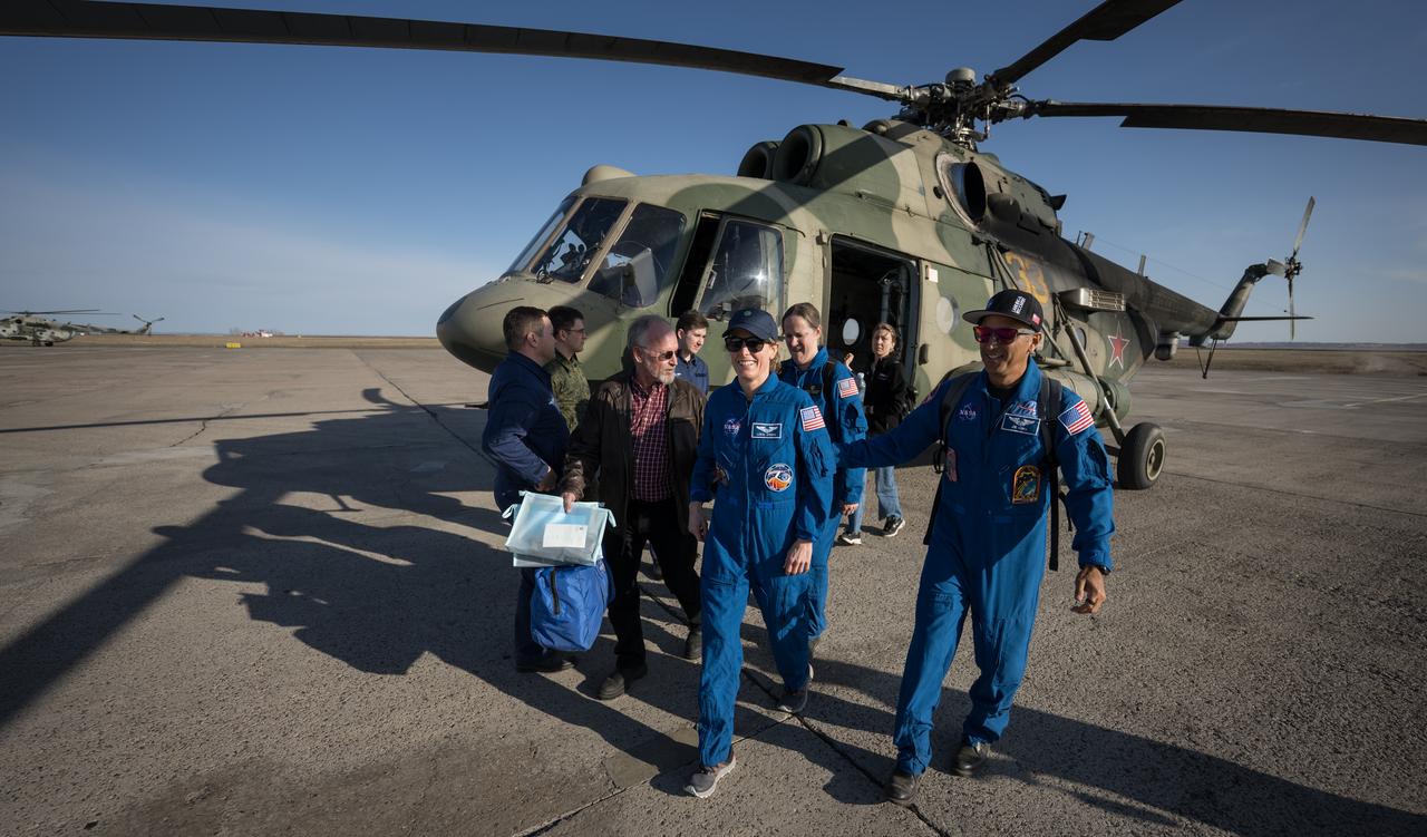 Expedition 70 NASA astronaut Loral O'Hara, center, is seen with NASA Director for Human Space Flight Programs, Russia, Mark Thiessen, left, and NASA Chief of the Astronaut Office Joe Acaba, right, as she arrives at the Karaganda Airport in Kazakhstan a few hours after she, Roscosmos cosmonaut Oleg Novitskiy, and Belarus spaceflight participant Marina Vasilevskaya landed in their Soyuz MS-24 spacecraft in a remote area near the town of Zhezkazgan, Kazakhstan on Saturday, April 6, 2024. O’Hara is returning to Earth after logging 204 days in space as a member of Expeditions 69-70 aboard the International Space Station and Novitskiy and Vasilevskaya return after having spent the last 14 days in space. Photo Credit (NASA/Bill Ingalls)