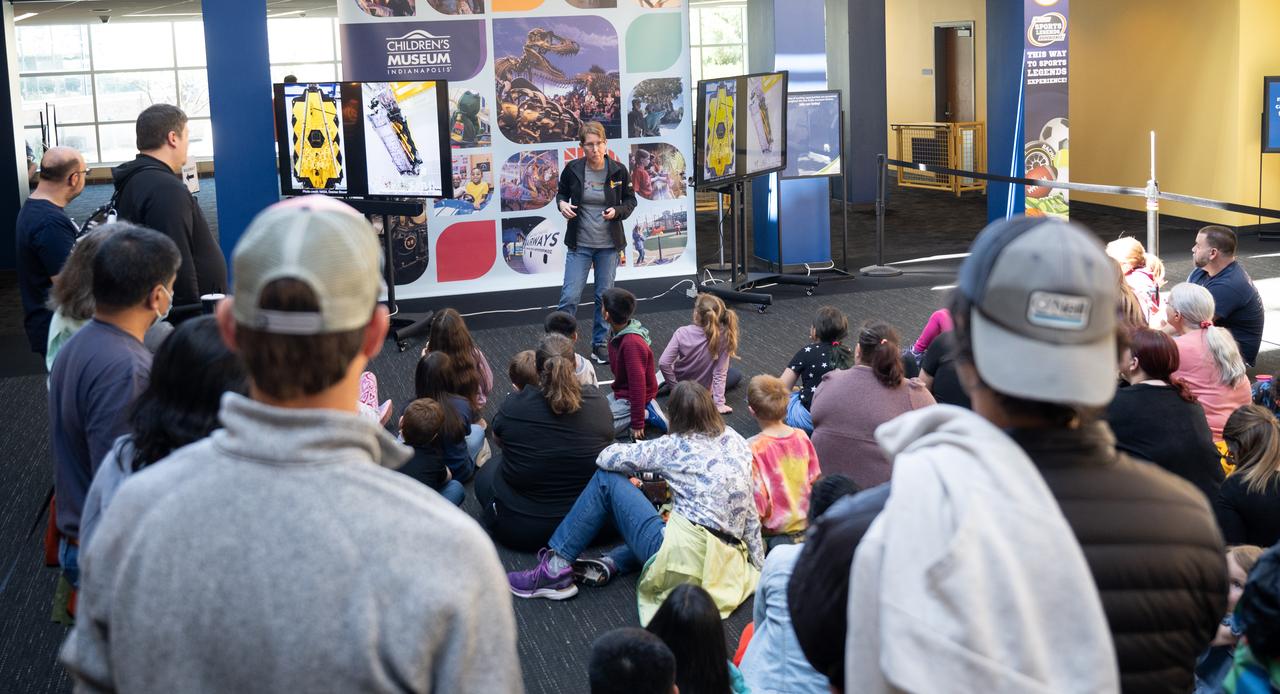 Jane Rigby, senior project scientist for NASA's James Webb Space Telescope, speaks to visitors at The Children’s Museum of Indianapolis, Saturday, April 6, 2024, in Indianapolis, Ind. On Monday, April 8, a total solar eclipse will sweep across a narrow portion of the North American continent from Mexico’s Pacific coast to the Atlantic coast of Newfoundland, Canada, while a partial solar eclipse will be visible across the entire North American continent along with parts of Central America and Europe. Photo Credit: (NASA/Joel Kowsky)