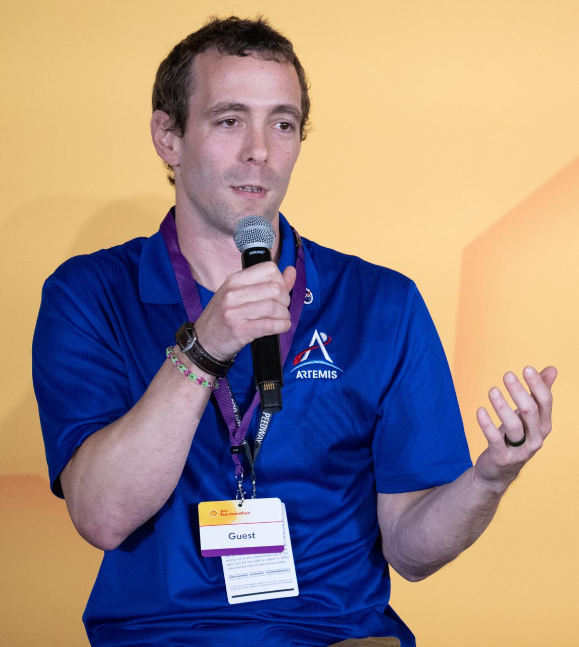 Logan Kennedy, surface lead for Human Landing System Programs in NASA's Exploration Systems Development Mission Directorate, speaks to students about power production and energy for the Artemis Program at the Shell Eco-marathon Americas, Saturday, April 6, 2024, at the Indianapolis Motor Speedway in Indianapolis, Ind. Photo Credit: (NASA/Joel Kowsky)