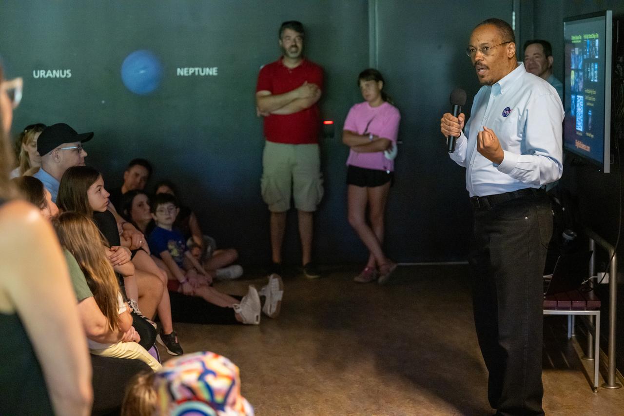 Former NASA astronaut Alvin Drew, right, speaks with guests at the Dallas Arboretum, Sunday, April 7, 2024, in Dallas, Texas. On Monday, April 8, a total solar eclipse will sweep across a narrow portion of the North American continent from Mexico’s Pacific coast to the Atlantic coast of Newfoundland, Canada, while a partial solar eclipse will be visible across the entire North American continent along with parts of Central America and Europe. Photo Credit: (NASA/Keegan Barber)