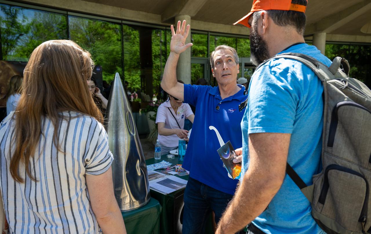 NASA Heliophysics Science Division Instrument Systems Engineer Patrick Haas speaks to guests about the upcoming total solar eclipse at the Dallas Arboretum, Sunday, April 7, 2024, in Dallas, Texas. On Monday, April 8, a total solar eclipse will sweep across a narrow portion of the North American continent from Mexico’s Pacific coast to the Atlantic coast of Newfoundland, Canada, while a partial solar eclipse will be visible across the entire North American continent along with parts of Central America and Europe. Photo Credit: (NASA/Keegan Barber)