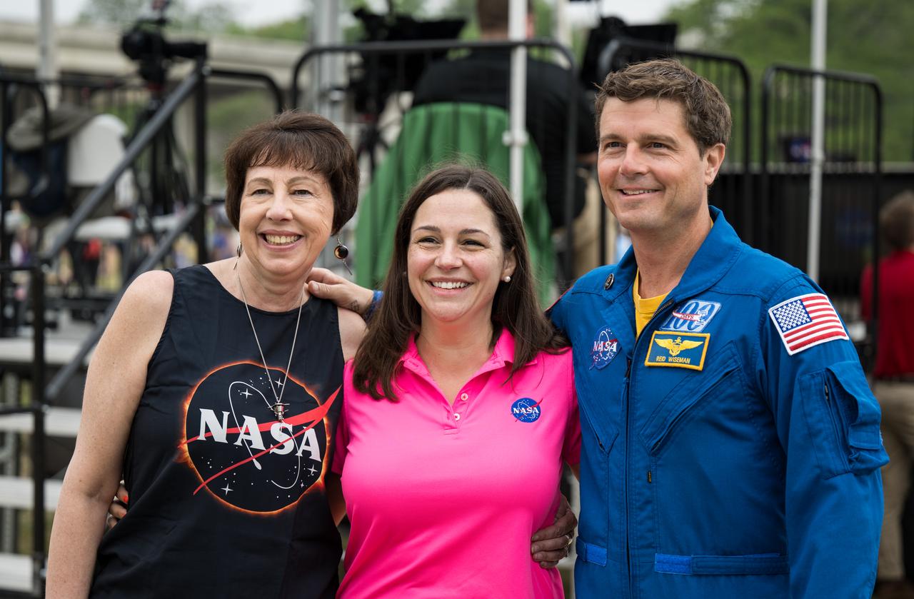 NASA Associate Administrator for the Science Mission directorate, Dr. Nicky Fox, Eclipse Engagement Lead Alex Lockwood, and NASA astronaut Reid Wiseman pose for a photos as they prepare to watch a total solar eclipse in Kerrville, TX on Monday, April 8, 2024. A total solar eclipse swept across a narrow portion of the North American continent from Mexico’s Pacific coast to the Atlantic coast of Newfoundland, Canada. A partial solar eclipse was visible across the entire North American continent along with parts of Central America and Europe.  Photo Credit: (NASA/Aubrey Gemignani)