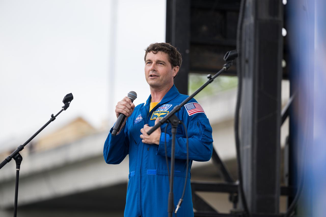 Astronaut Reid Wiseman speaks on the main stage at the Kerrville eclipse festival in Kerrville, TX on Monday, April 8, 2024. A total solar eclipse swept across a narrow portion of the North American continent from Mexico’s Pacific coast to the Atlantic coast of Newfoundland, Canada. A partial solar eclipse was visible across the entire North American continent along with parts of Central America and Europe.  Photo Credit: (NASA/Aubrey Gemignani)