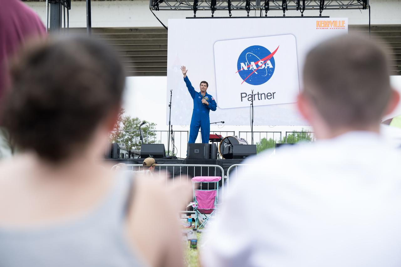 Astronaut Reid Wiseman speaks on the main stage at the Kerrville eclipse festival in Kerrville, TX on Monday, April 8, 2024. A total solar eclipse swept across a narrow portion of the North American continent from Mexico’s Pacific coast to the Atlantic coast of Newfoundland, Canada. A partial solar eclipse was visible across the entire North American continent along with parts of Central America and Europe.  Photo Credit: (NASA/Aubrey Gemignani)