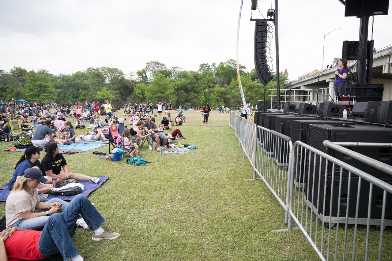NASA Chief Scientist Kate Calvin speaks on the main stage at the Kerrville eclipse festival in Kerrville, TX on Monday, April 8, 2024. A total solar eclipse swept across a narrow portion of the North American continent from Mexico’s Pacific coast to the Atlantic coast of Newfoundland, Canada. A partial solar eclipse was visible across the entire North American continent along with parts of Central America and Europe.  Photo Credit: (NASA/Aubrey Gemignani)
