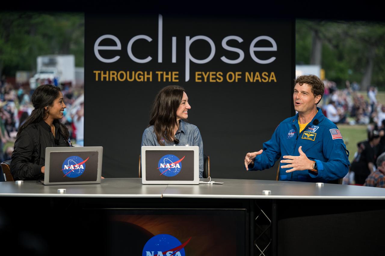 NASA Broadcast Host Tahira Allen, Space Physicist Gina DiBraccio, and NASA astronaut Reid Wiseman are seen during the broadcast of the total solar eclipse in Kerrville, TX on Monday, April 8, 2024. A total solar eclipse swept across a narrow portion of the North American continent from Mexico’s Pacific coast to the Atlantic coast of Newfoundland, Canada. A partial solar eclipse was visible across the entire North American continent along with parts of Central America and Europe.  Photo Credit: (NASA/Aubrey Gemignani)