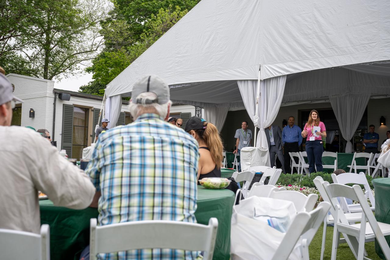 NASA Deputy Associate Administrator Casey Swails speaks to guests about the upcoming total solar eclipse at the Dallas Arboretum, Monday, April 8, 2024, in Dallas, Texas. A total solar eclipse swept across a narrow portion of the North American continent from Mexico’s Pacific coast to the Atlantic coast of Newfoundland, Canada. A partial solar eclipse was visible across the entire North American continent along with parts of Central America and Europe. Photo Credit: (NASA/Keegan Barber)