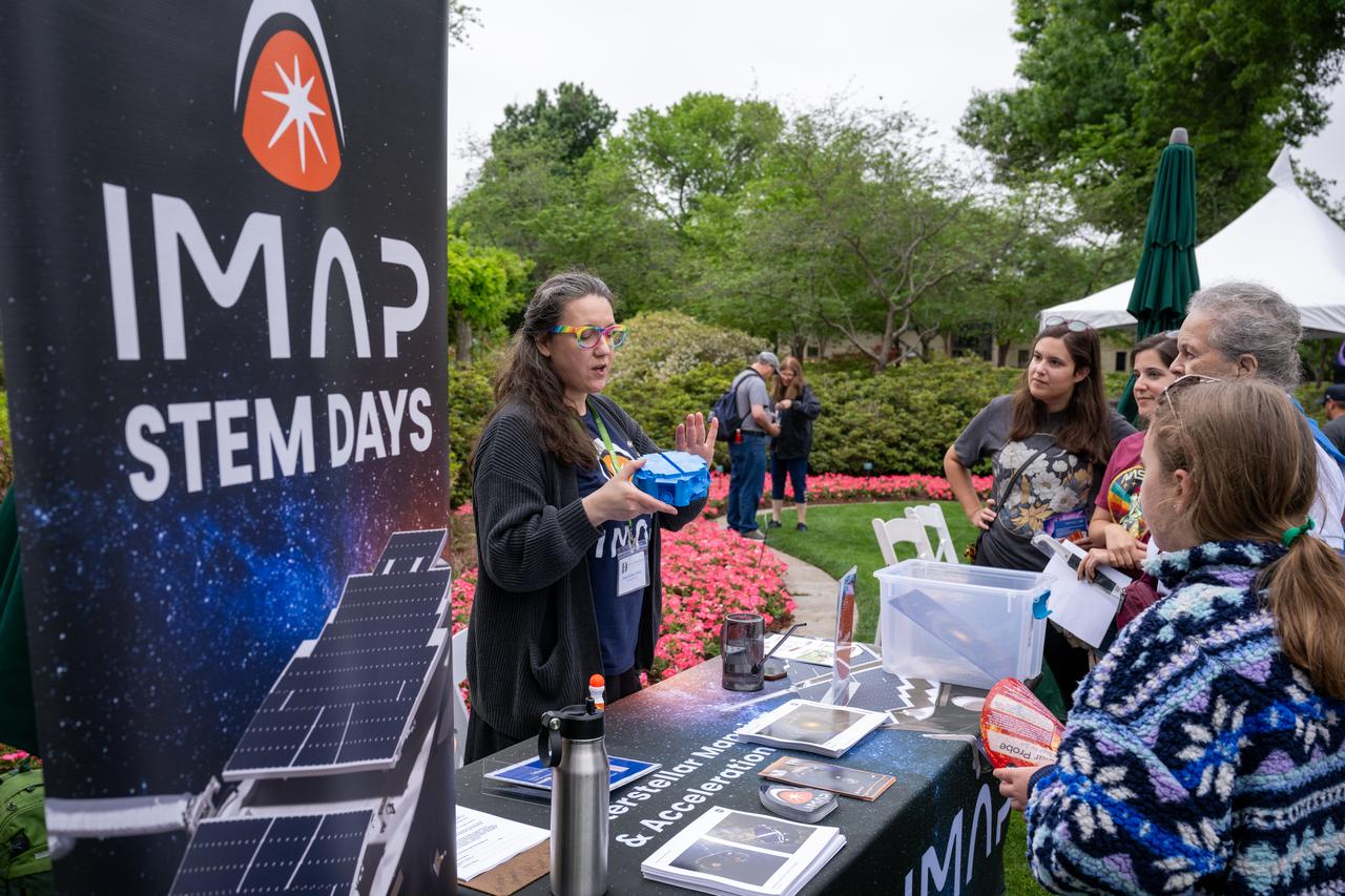 Guests learn about the total solar eclipse from NASA staff at the Dallas Arboretum, Monday, April 8, 2024, in Dallas, Texas. A total solar eclipse swept across a narrow portion of the North American continent from Mexico’s Pacific coast to the Atlantic coast of Newfoundland, Canada. A partial solar eclipse was visible across the entire North American continent along with parts of Central America and Europe. Photo Credit: (NASA/Keegan Barber) in Dallas, Texas on Monday, April 8, 2024. A total solar eclipse swept across a narrow portion of the North American continent from Mexico’s Pacific coast to the Atlantic coast of Newfoundland, Canada. A partial solar eclipse was visible across the entire North American continent along with parts of Central America and Europe. Photo Credit: (NASA/Keegan Barber)