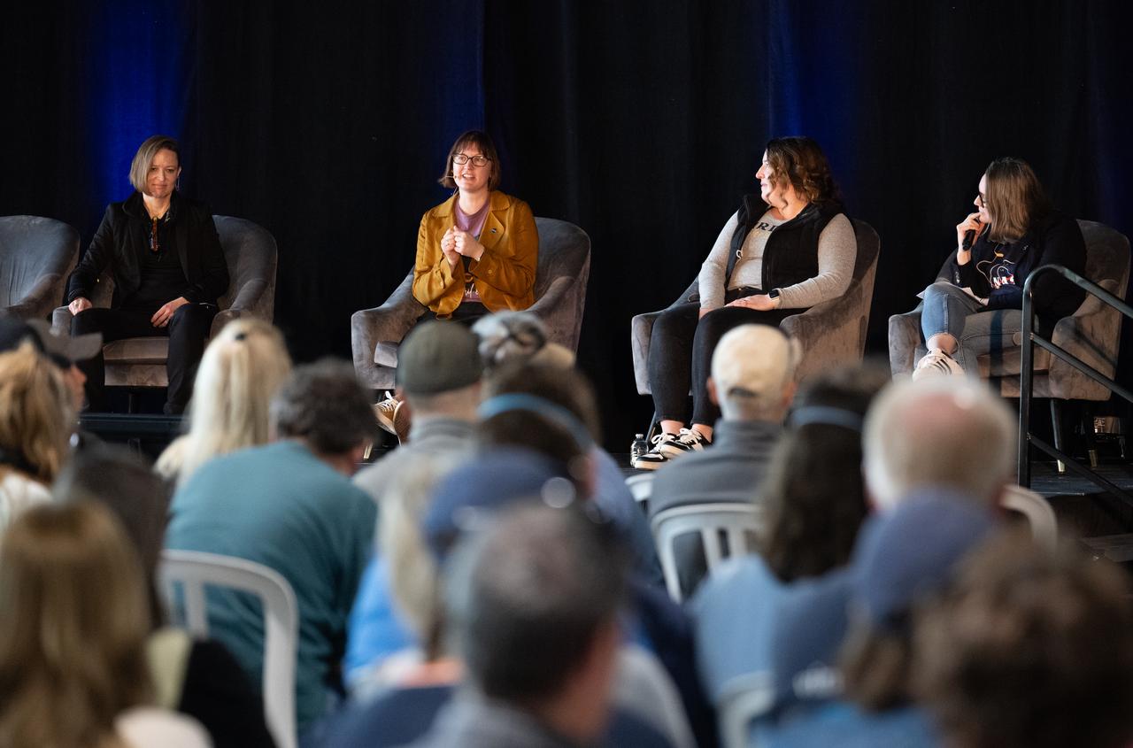 Carolin Frueh, associate professor of Aeronautics and Astronautics at Purdue University, left, Heather Futrell, program executive in the Heliophysics Division of NASA's Science Mission Directorate, Briony Horgan, associate professor of Planetary Science at Purdue University, and Nicole Rayl, associate director for Flight Programs in the Heliophysics Divison of NASA's Science Mission Directorate, speak to attendees at the Indianapolis Motor Speedway during a panel discussion about the Parker Solar Probe and space weather ahead of the total solar eclipse, Monday, April 8, 2024, in Indianapolis, Ind. A total solar eclipse swept across a narrow portion of the North American continent from Mexico’s Pacific coast to the Atlantic coast of Newfoundland, Canada. A partial solar eclipse was visible across the entire North American continent along with parts of Central America and Europe.  Photo Credit: (NASA/Joel Kowsky)