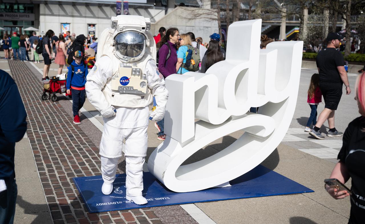 Spacey Casey is seen on Pagoda Plaza at the Indianapolis Motor Speedway ahead of the total solar eclipse, Monday, April 8, 2024, in Indianapolis, Ind. A total solar eclipse swept across a narrow portion of the North American continent from Mexico’s Pacific coast to the Atlantic coast of Newfoundland, Canada. A partial solar eclipse was visible across the entire North American continent along with parts of Central America and Europe.  Photo Credit: (NASA/Joel Kowsky)