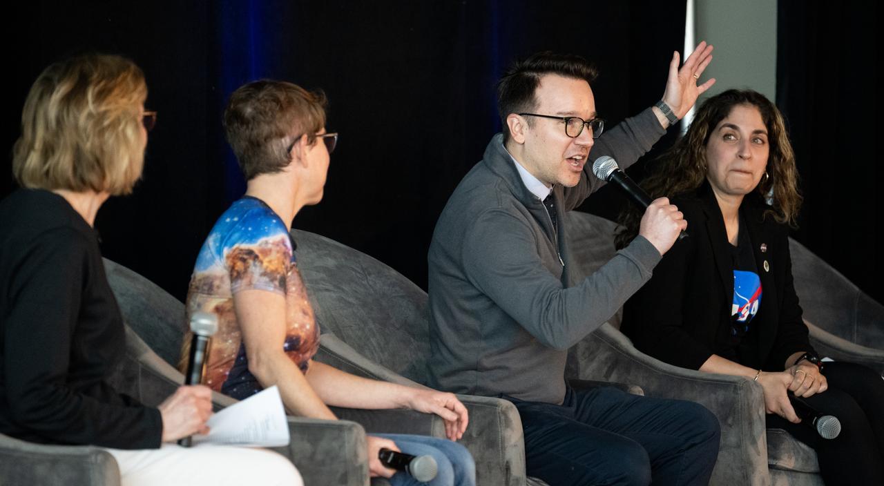Danny Milisavljevic, associate professor of Physics and Astronomy at Purdue University, speaks to attendees at the Indianapolis Motor Speedway during a panel discussion along with Peg Luce, deputy director of the Heliophysics Division of NASA's Science Mission Directorate, Jane Rigby, senior project scientist for NASA's James Webb Space Telescope, and Asal Naseri, program executive in the Heliophysics Division of NASA's Science Mission Directorate, about the James Webb Space Telescope ahead of the total solar eclipse, Monday, April 8, 2024, in Indianapolis, Ind. A total solar eclipse swept across a narrow portion of the North American continent from Mexico’s Pacific coast to the Atlantic coast of Newfoundland, Canada. A partial solar eclipse was visible across the entire North American continent along with parts of Central America and Europe.  Photo Credit: (NASA/Joel Kowsky)