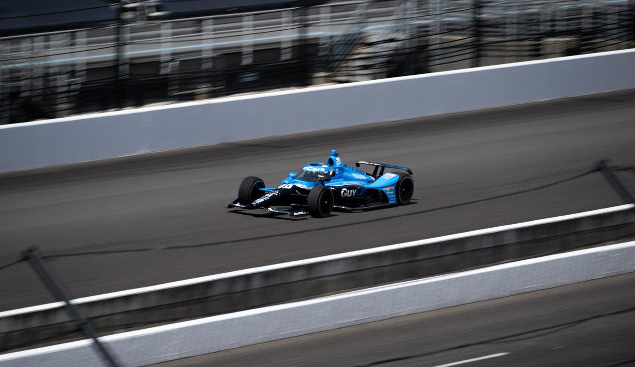 An NTT INDY car is seen as it is driven by Ed Carpenter, around the track following opening ceremonies at the Indianapolis Motor Speedway ahead of the total solar eclipse, Monday, April 8, 2024, in Indianapolis, Ind. A total solar eclipse swept across a narrow portion of the North American continent from Mexico’s Pacific coast to the Atlantic coast of Newfoundland, Canada. A partial solar eclipse was visible across the entire North American continent along with parts of Central America and Europe.  Photo Credit: (NASA/Joel Kowsky)