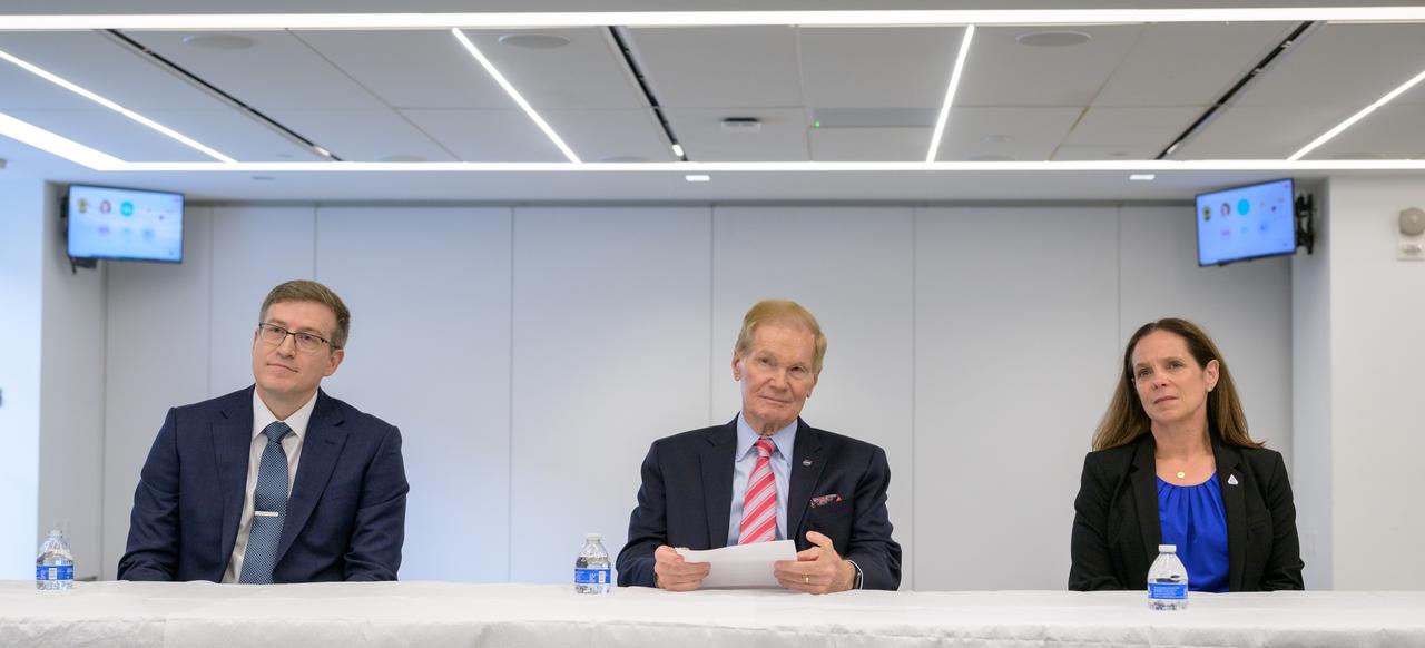 NASA Pressurized Rover Project Manager Danny Newswander, left, NASA Administrator Bill Nelson, and NASA Extravehicular Activity and Human Surface Mobility Program Lara Kearney, right, discuss the historic agreement signed April 9th at NASA Headquarters, between the United States and Japan to advance sustainable human exploration of the Moon, Wednesday, April 10, 2024, at the Japan Aerospace Exploration Agency (JAXA) offices in Washington. Under the agreement, Japan will design, develop, and operate a pressurized rover for crewed and uncrewed exploration on the Moon. NASA will provide the launch and delivery of the rover to the Moon as well as two Japanese astronaut missions to the lunar surface. Photo Credit: Photo Credit: (NASA/Bill Ingalls)
