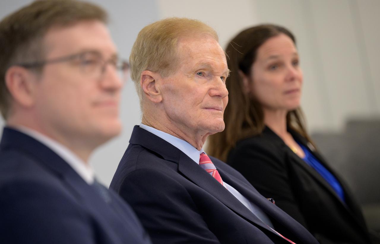 NASA Pressurized Rover Project Manager Danny Newswander, left, NASA Administrator Bill Nelson, and NASA Extravehicular Activity and Human Surface Mobility Program Lara Kearney, right, discuss the historic agreement signed April 9th at NASA Headquarters, between the United States and Japan to advance sustainable human exploration of the Moon, Wednesday, April 10, 2024, at the Japan Aerospace Exploration Agency (JAXA) offices in Washington. Under the agreement, Japan will design, develop, and operate a pressurized rover for crewed and uncrewed exploration on the Moon. NASA will provide the launch and delivery of the rover to the Moon as well as two Japanese astronaut missions to the lunar surface. Photo Credit: Photo Credit: (NASA/Bill Ingalls)