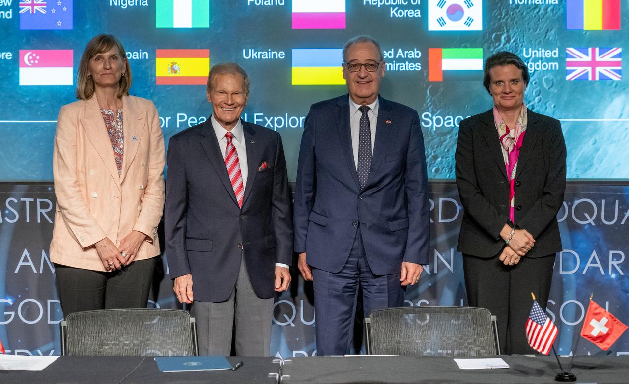 From left to right, Acting Department of State Deputy Assistant Secretary Valda Vikmanis,  NASA Administrator Bill Nelson, Swiss Federal Councillor Guy Parmelin, and Swiss State Secretary Martina Hirayama, pose for a photo during an Artemis Accords signing ceremony, Monday, April 15, 2024, at the Mary W. Jackson NASA Headquarters building in Washington. Switzerland is the 37th country to sign the Artemis Accords, which establish a practical set of principles to guide space exploration cooperation among nations participating in NASA’s Artemis program. Photo Credit: (NASA/Keegan Barber)