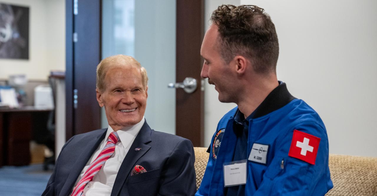 NASA Administrator Bill Nelson, left, and ESA (European Space Agency) astronaut Marco Sieber, right, meet prior to an Artemis Accords signing ceremony, Monday, April 15, 2024, at the Mary W. Jackson NASA Headquarters building in Washington. Switzerland is the 37th country to sign the Artemis Accords, which establish a practical set of principles to guide space exploration cooperation among nations participating in NASA’s Artemis program. Photo Credit: (NASA/Keegan Barber)
