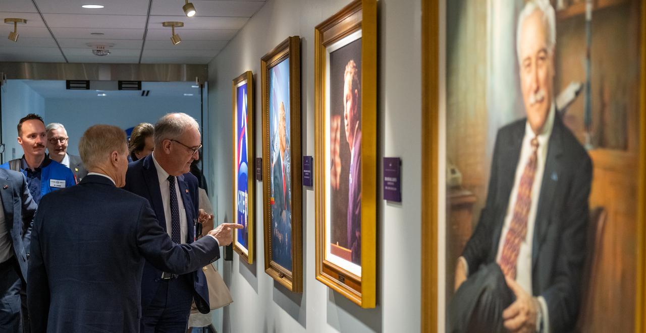 NASA Administrator Bill Nelson shows portraits of former NASA Administrators to members of a Swiss delegation prior to an Artemis Accords signing ceremony, Monday, April 15, 2024, at the Mary W. Jackson NASA Headquarters building in Washington. Switzerland is the 37th country to sign the Artemis Accords, which establish a practical set of principles to guide space exploration cooperation among nations participating in NASA’s Artemis program. Photo Credit: (NASA/Keegan Barber)