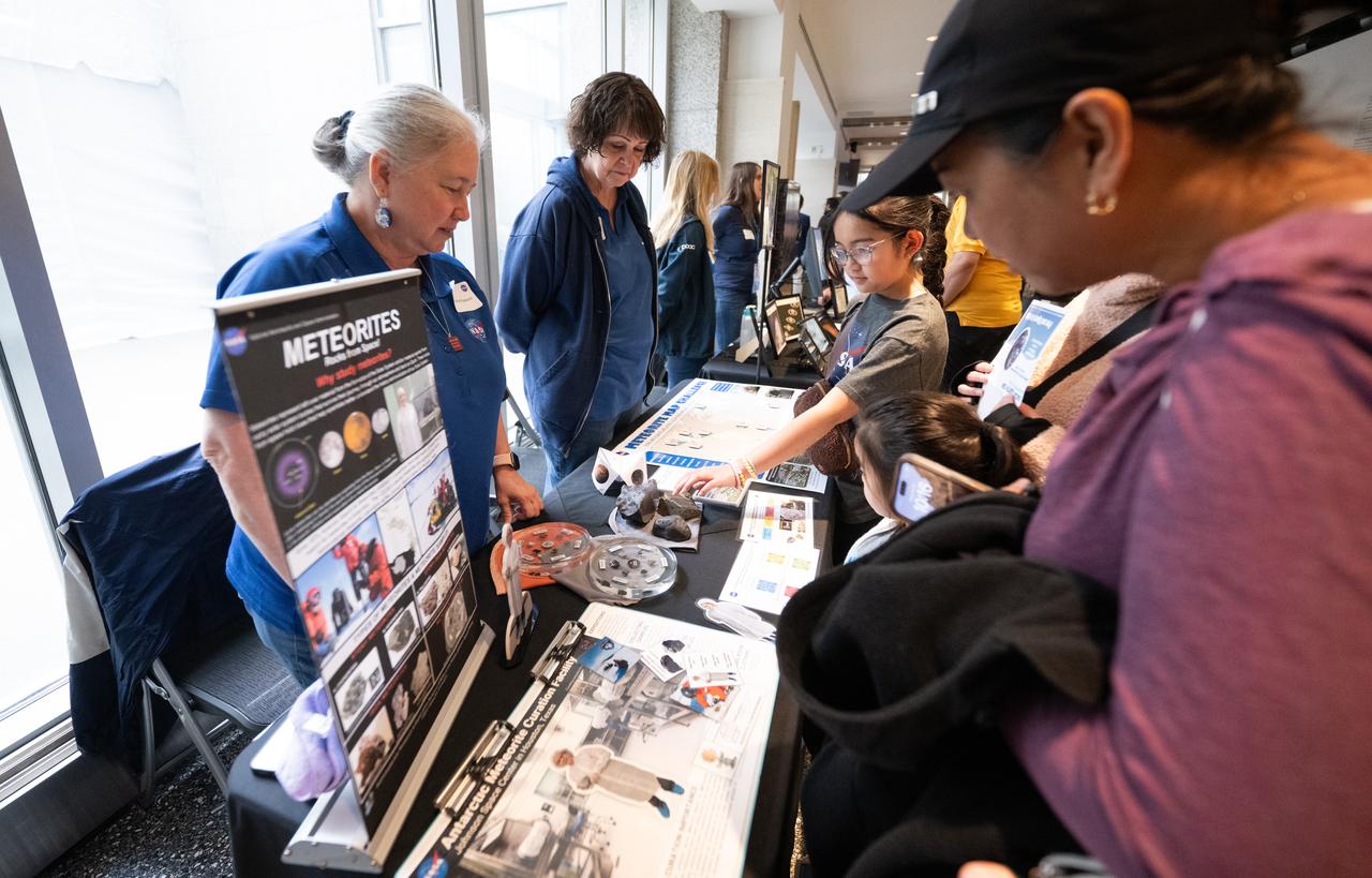 Visitors to NASA’s Earth Information Center view exhibits and hands-on activities as NASA celebrates Earth Day, Friday, April 19, 2024, at the Mary W. Jackson NASA Headquarters building in Washington. Photo Credit: (NASA/Joel Kowsky)
