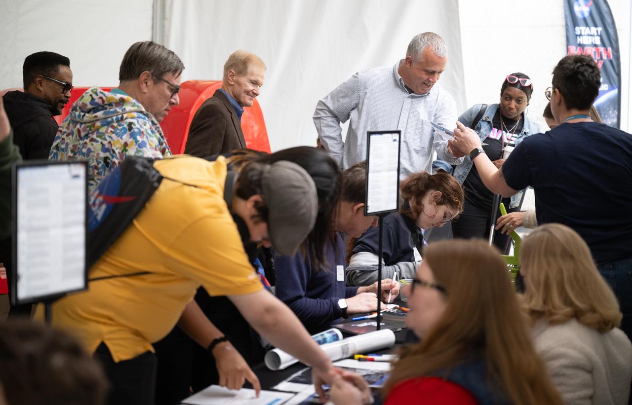 NASA Administrator Bill Nelson, looks on as visitors to NASA’s Earth Information Center view exhibits and participate in hands-on activities as NASA celebrates Earth Day, Friday, April 19, 2024, at the Mary W. Jackson NASA Headquarters building in Washington. Photo Credit: (NASA/Joel Kowsky)