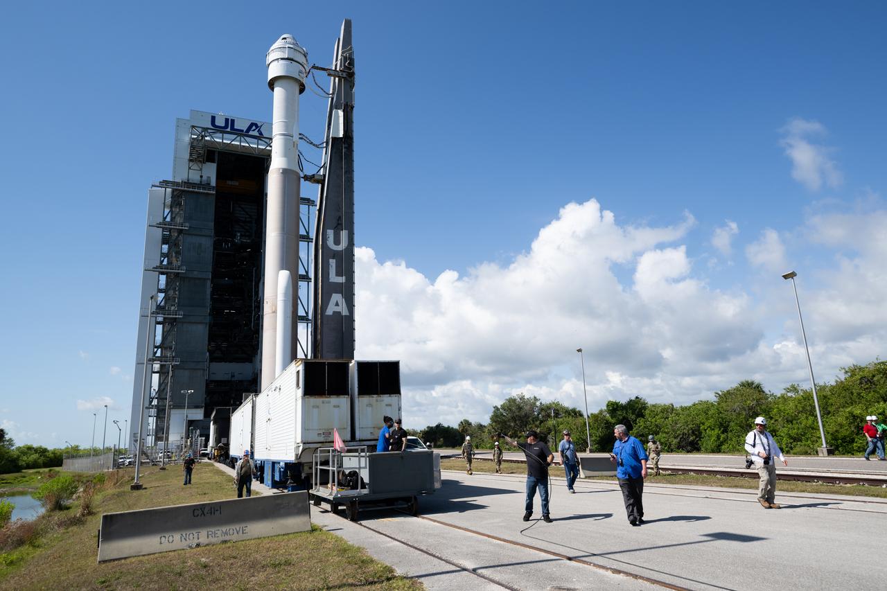 A United Launch Alliance Atlas V rocket with Boeing’s CST-100 Starliner spacecraft aboard is seen as it is rolled out of the Vertical Integration Facility to the launch pad at Space Launch Complex 41 ahead of the NASA’s Boeing Crew Flight Test, Saturday, May 4, 2024 at Cape Canaveral Space Force Station in Florida. NASA’s Boeing Crew Flight Test is the first launch with astronauts aboard the Starliner spacecraft and Atlas V rocket to the International Space Station as part of the agency’s Commercial Crew Program. The flight test, targeted for launch at 10:34 p.m. EDT on Monday, May 6, serves as an end-to-end demonstration of Boeing’s crew transportation system and will carry NASA astronauts Butch Wilmore and Suni Williams to and from the orbiting laboratory. Photo Credit: (NASA/Joel Kowsky)