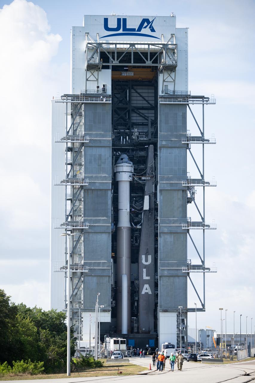 A United Launch Alliance Atlas V rocket with Boeing’s CST-100 Starliner spacecraft aboard is seen inside the Vertical Integration Facility before being rolled out to the launch pad at Space Launch Complex 41 ahead of the NASA’s Boeing Crew Flight Test, Saturday, May 4, 2024 at Cape Canaveral Space Force Station in Florida. NASA’s Boeing Crew Flight Test is the first launch with astronauts aboard the Starliner spacecraft and Atlas V rocket to the International Space Station as part of the agency’s Commercial Crew Program. The flight test, targeted for launch at 10:34 p.m. EDT on Monday, May 6, serves as an end-to-end demonstration of Boeing’s crew transportation system and will carry NASA astronauts Butch Wilmore and Suni Williams to and from the orbiting laboratory. Photo Credit: (NASA/Joel Kowsky)