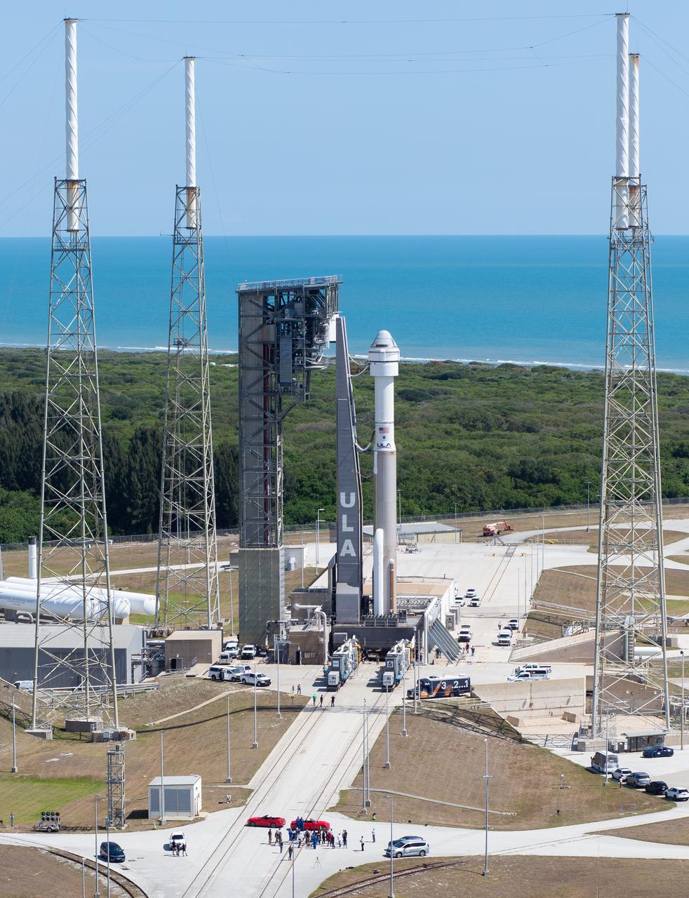 A United Launch Alliance Atlas V rocket with Boeing’s CST-100 Starliner spacecraft aboard is seen as it is rolled out of the Vertical Integration Facility to the launch pad at Space Launch Complex 41 ahead of the NASA’s Boeing Crew Flight Test, Saturday, May 4, 2024 at Cape Canaveral Space Force Station in Florida. NASA’s Boeing Crew Flight Test is the first launch with astronauts aboard the Starliner spacecraft and Atlas V rocket to the International Space Station as part of the agency’s Commercial Crew Program. The flight test, targeted for launch at 10:34 p.m. EDT on Monday, May 6, serves as an end-to-end demonstration of Boeing’s crew transportation system and will carry NASA astronauts Butch Wilmore and Suni Williams to and from the orbiting laboratory. Photo Credit: (NASA/Joel Kowsky)