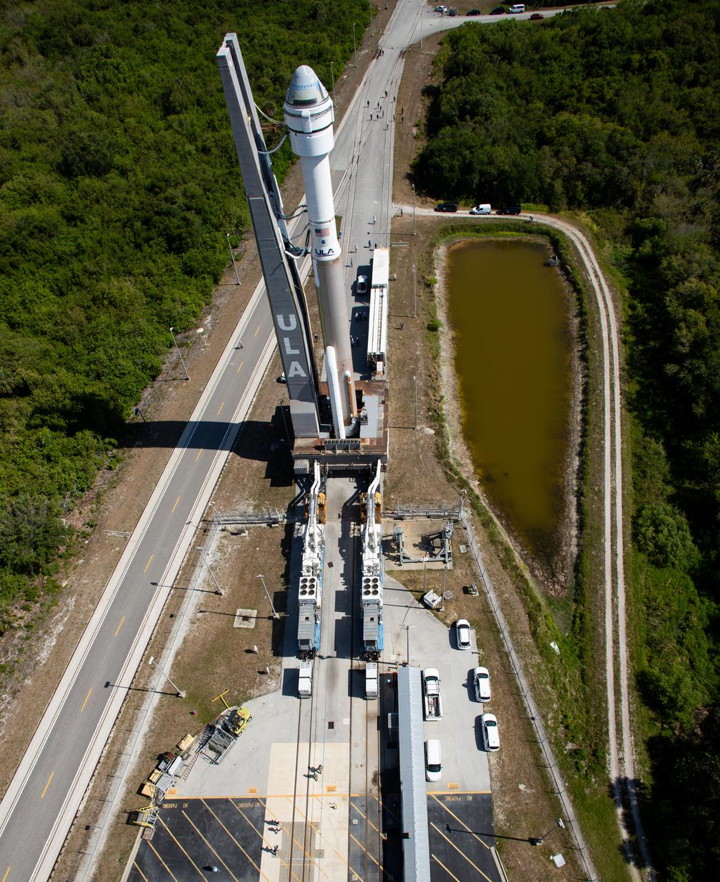 A United Launch Alliance Atlas V rocket with Boeing’s CST-100 Starliner spacecraft aboard is seen as it is rolled out of the Vertical Integration Facility to the launch pad at Space Launch Complex 41 ahead of the NASA’s Boeing Crew Flight Test, Saturday, May 4, 2024 at Cape Canaveral Space Force Station in Florida. NASA’s Boeing Crew Flight Test is the first launch with astronauts aboard the Starliner spacecraft and Atlas V rocket to the International Space Station as part of the agency’s Commercial Crew Program. The flight test, targeted for launch at 10:34 p.m. EDT on Monday, May 6, serves as an end-to-end demonstration of Boeing’s crew transportation system and will carry NASA astronauts Butch Wilmore and Suni Williams to and from the orbiting laboratory. Photo Credit: (NASA/Joel Kowsky)