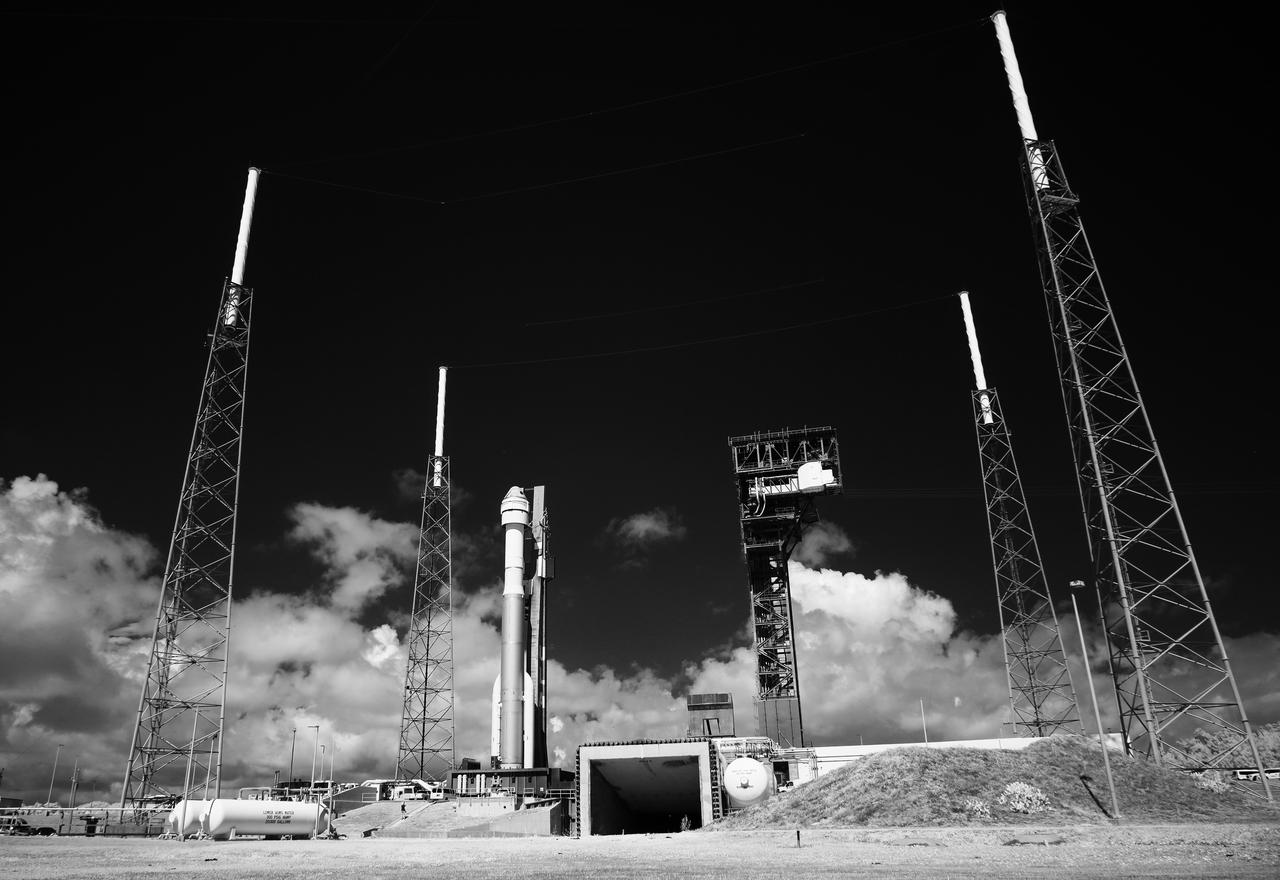 In this black and white infrared images, a United Launch Alliance Atlas V rocket with Boeing’s CST-100 Starliner spacecraft aboard is seen as it is rolled out of the Vertical Integration Facility to the launch pad at Space Launch Complex 41 ahead of the NASA’s Boeing Crew Flight Test, Saturday, May 4, 2024 at Cape Canaveral Space Force Station in Florida. NASA’s Boeing Crew Flight Test is the first launch with astronauts of the Boeing CFT-100 spacecraft and United Launch Alliance Atlas V rocket to the International Space Station as part of the agency’s Commercial Crew Program. The flight test, targeted for launch at 10:34 p.m. EDT on Monday, May 6, serves as an end-to-end demonstration of Boeing’s crew transportation system and will carry NASA astronauts Butch Wilmore and Suni Williams to and from the orbiting laboratory. Photo Credit: (NASA/Joel Kowsky)