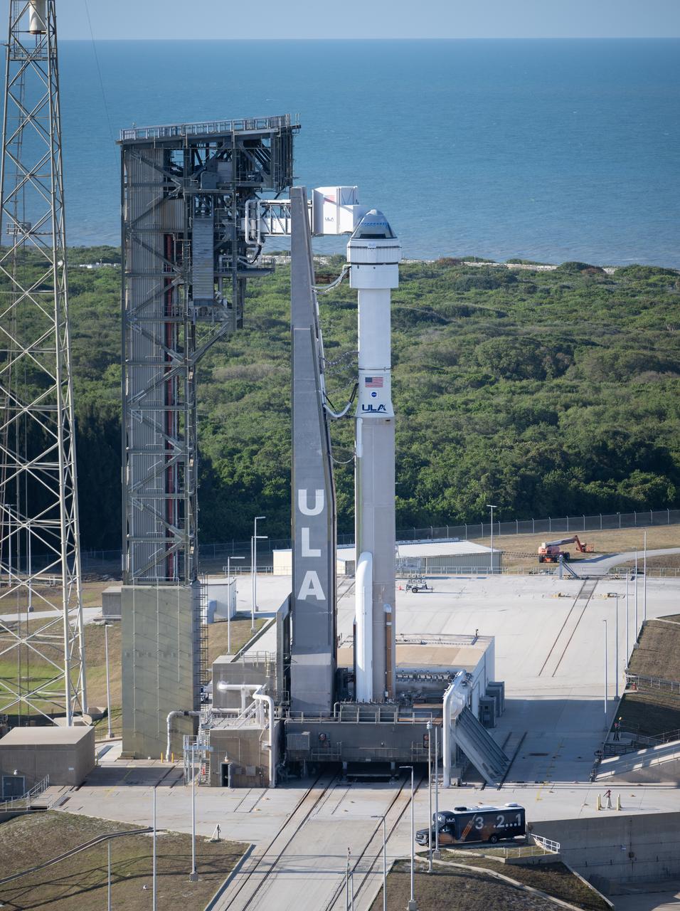 A United Launch Alliance Atlas V rocket with Boeing’s CST-100 Starliner spacecraft aboard is seen on the launch pad at Space Launch Complex 41 ahead of the NASA’s Boeing Crew Flight Test, Sunday, May 5, 2024 at Cape Canaveral Space Force Station in Florida. NASA’s Boeing Crew Flight Test is the first launch with astronauts of the Boeing CFT-100 spacecraft and United Launch Alliance Atlas V rocket to the International Space Station as part of the agency’s Commercial Crew Program. The flight test, targeted for launch at 10:34 p.m. EDT on Monday, May 6, serves as an end-to-end demonstration of Boeing’s crew transportation system and will carry NASA astronauts Butch Wilmore and Suni Williams to and from the orbiting laboratory. Photo Credit: (NASA/Joel Kowsky)