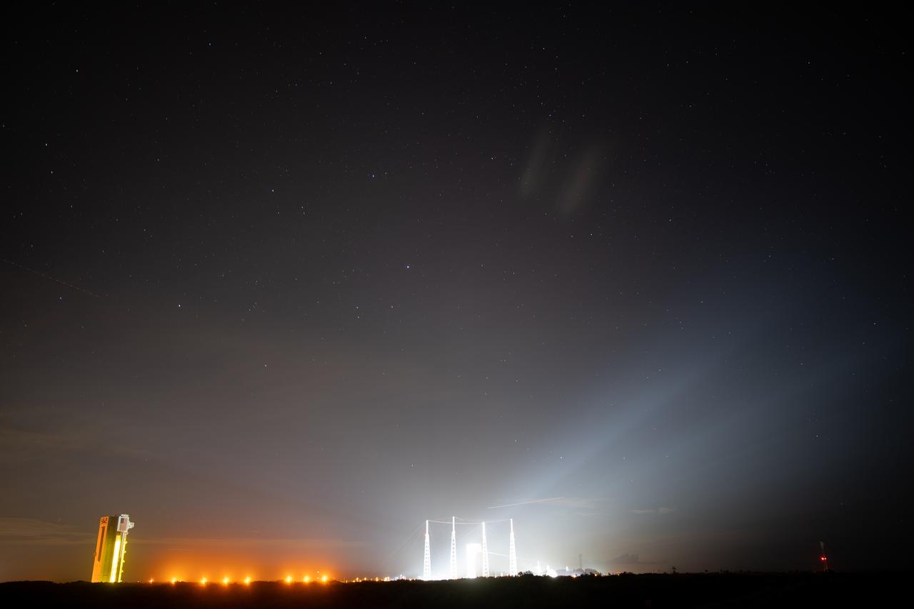 In this twenty-five second exposure, a United Launch Alliance Atlas V rocket with Boeing’s CST-100 Starliner spacecraft aboard is seen on the launch pad illuminated by spotlights at Space Launch Complex 41 ahead of the NASA’s Boeing Crew Flight Test, Sunday, May 5, 2024 at Cape Canaveral Space Force Station in Florida. NASA’s Boeing Crew Flight Test is the first launch with astronauts of the Boeing CFT-100 spacecraft and United Launch Alliance Atlas V rocket to the International Space Station as part of the agency’s Commercial Crew Program. The flight test, targeted for launch at 10:34 p.m. EDT on Monday, May 6, serves as an end-to-end demonstration of Boeing’s crew transportation system and will carry NASA astronauts Butch Wilmore and Suni Williams to and from the orbiting laboratory. Photo Credit: (NASA/NASA/Joel Kowsky)