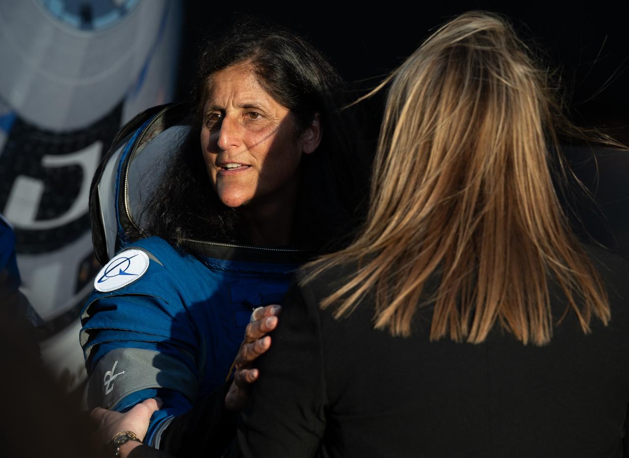 NASA astronaut Suni Williams is seen as she and fellow crewmate Butch Wilmore prepare to depart the Neil A. Armstrong Operations and Checkout Building for Launch Complex 41 on Cape Canaveral Space Force Station to board the Boeing CST-100 Starliner spacecraft for the Crew Flight Test launch, Monday, May 6, 2024, at NASA’s Kennedy Space Center in Florida. NASA’s Boeing Crew Flight Test is the first launch with astronauts of the Boeing CFT-100 spacecraft and United Launch Alliance Atlas V rocket to the International Space Station as part of the agency’s Commercial Crew Program. The flight test, targeted for launch at 10:34 p.m. EDT, serves as an end-to-end demonstration of Boeing’s crew transportation system and will carry NASA astronauts Butch Wilmore and Suni Williams to and from the orbiting laboratory. Photo Credit: (NASA/Joel Kowsky)
